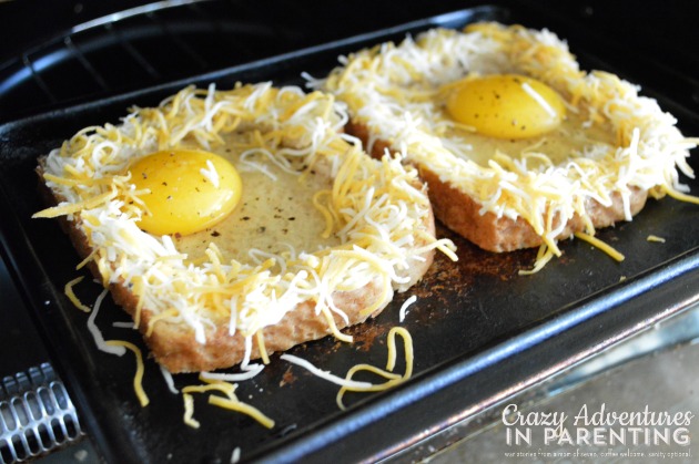 putting-cheesy-baked-egg-toast-in-toaster